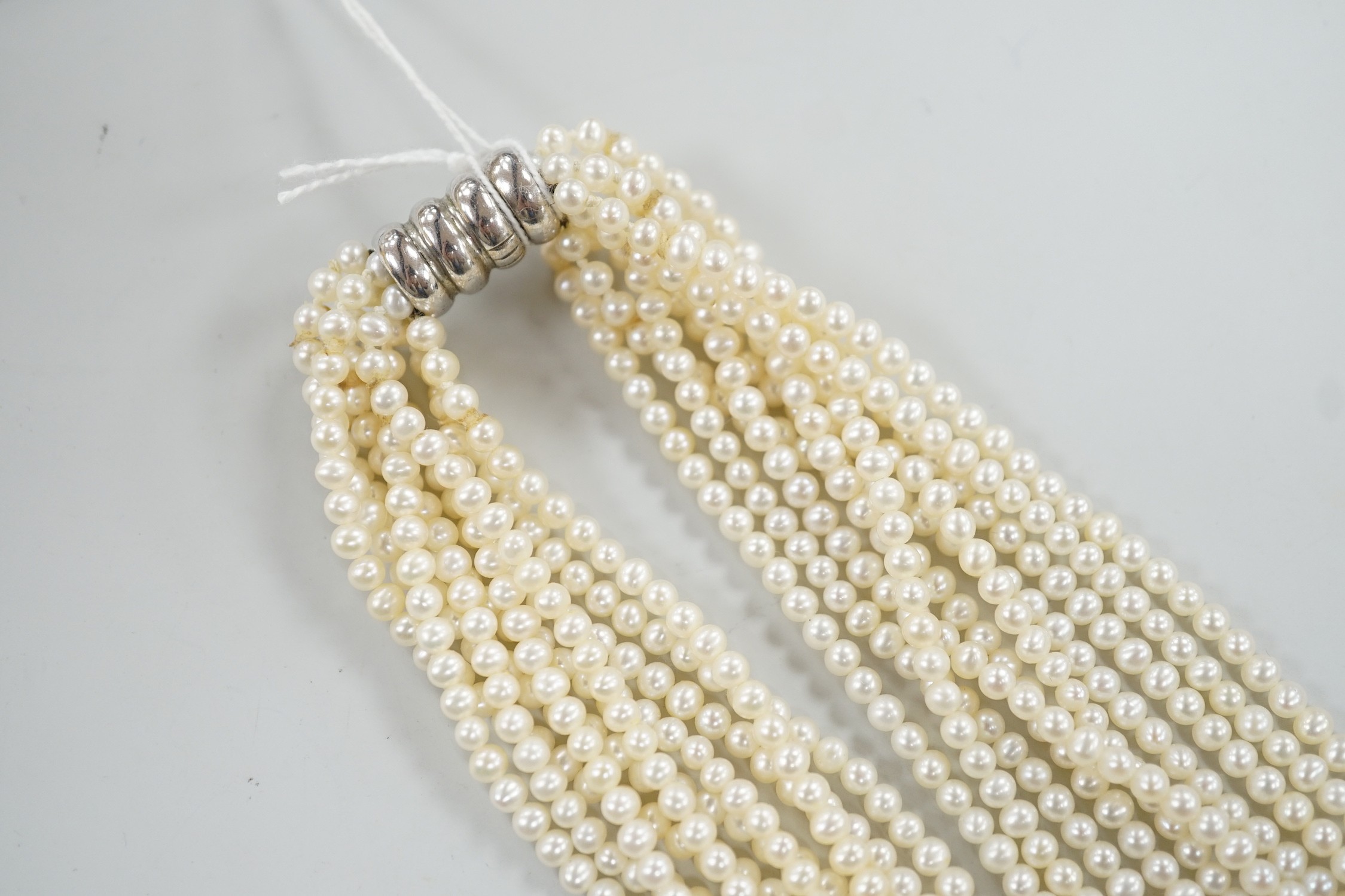 A modern multi strand cultured pearl necklace, with 925 clasp, 46cm.